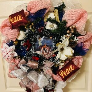 Festive Holiday Wreath with Pink and Gold Accents